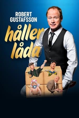 Robert Gustafsson holding the box Robert Gustafsson håller låda